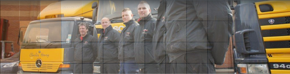 Contact Us by completing our Enquiry Form Removal Men standing ina line next to their company lorries